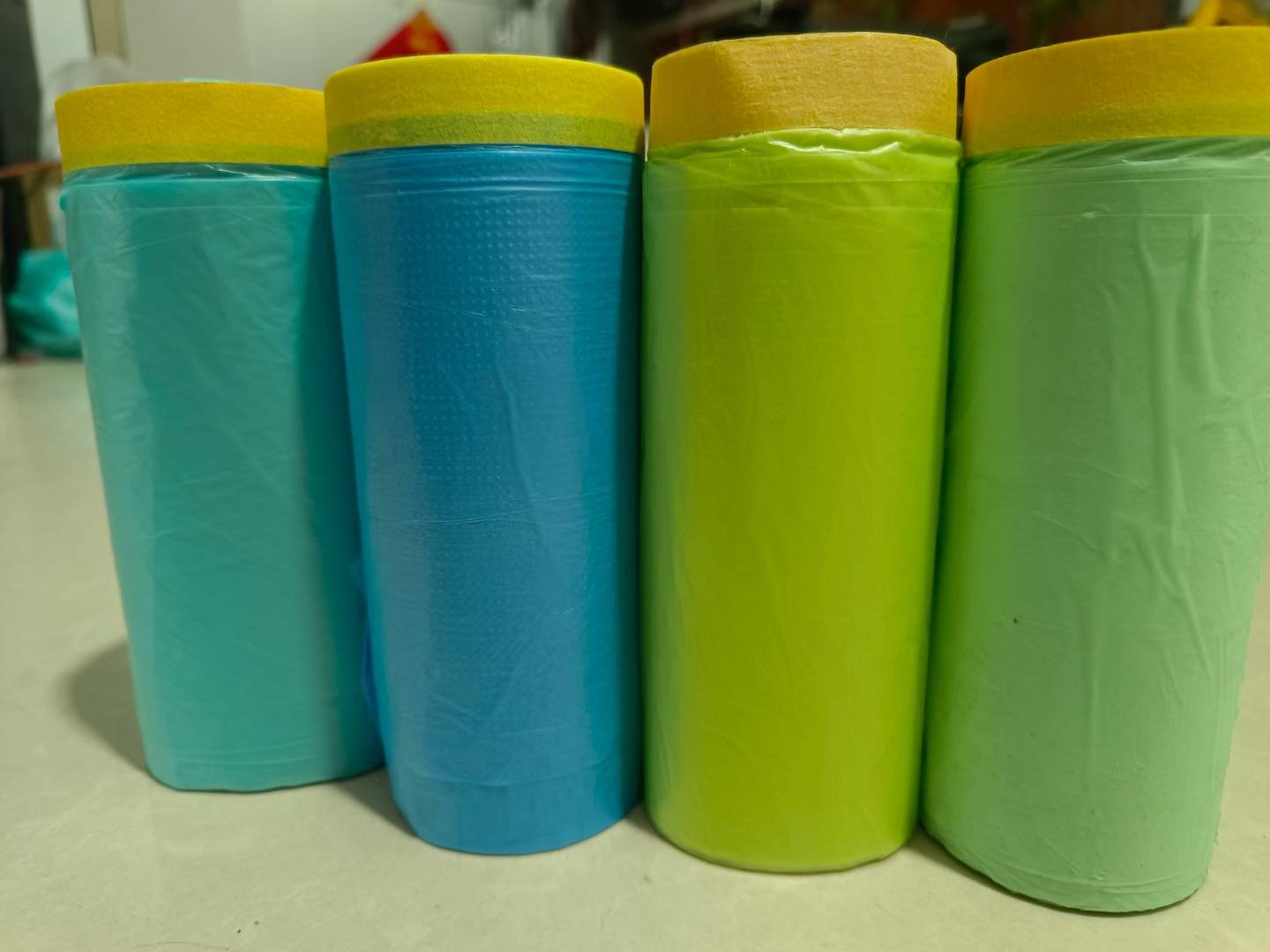 Pre-taped masking film
